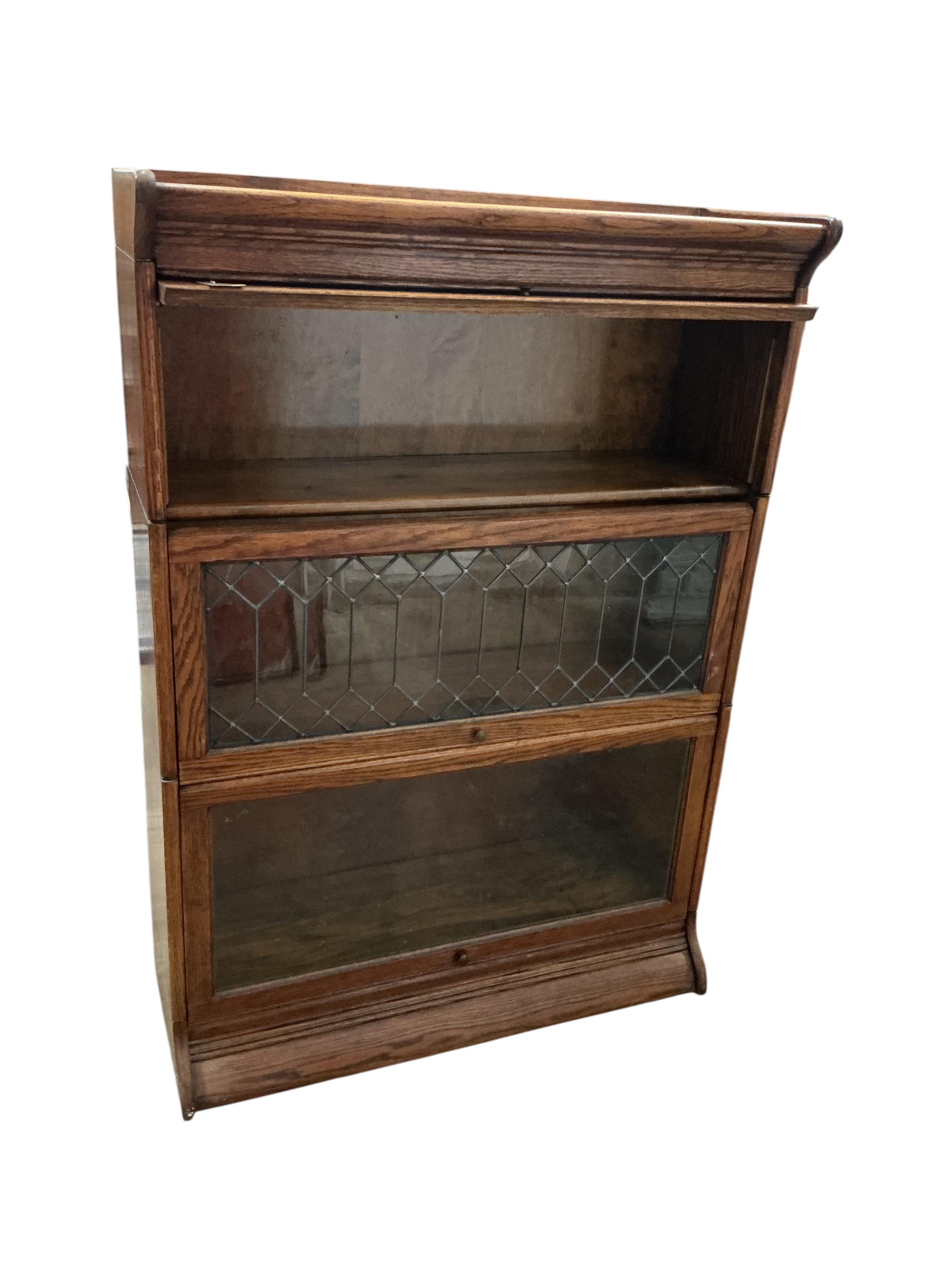 A Globe Wernicke style three section bookcase, width 86cm, depth 34cm, height 123cm